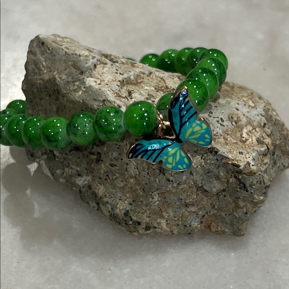 Green Beaded Bracelet with Butterfly Charm